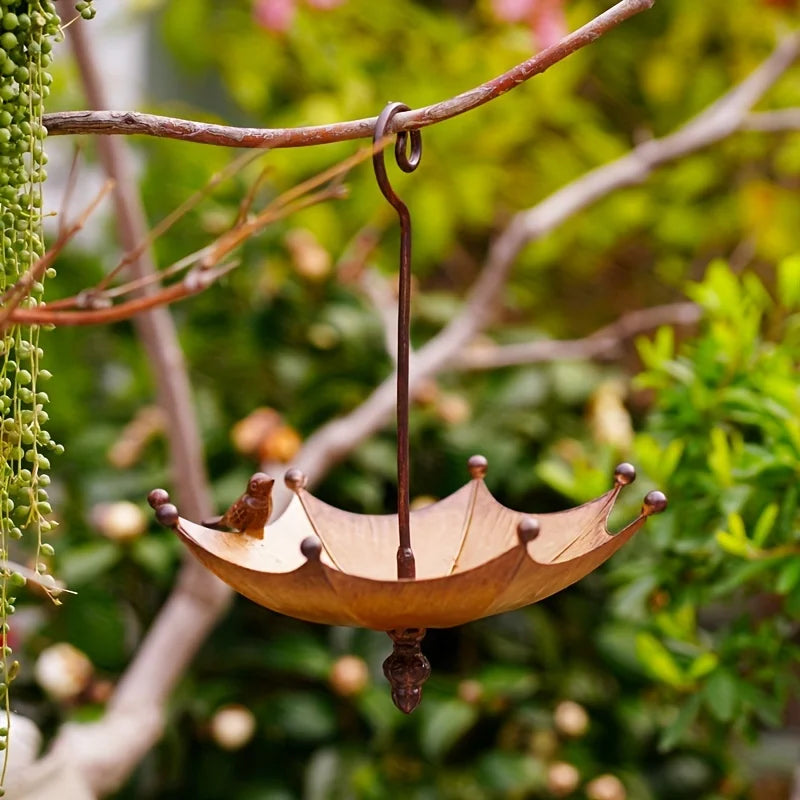 An antique umbrella shaped metal bird food tray, outdoor hanging bird bathtub and food bowl, decorative garden yard accessories